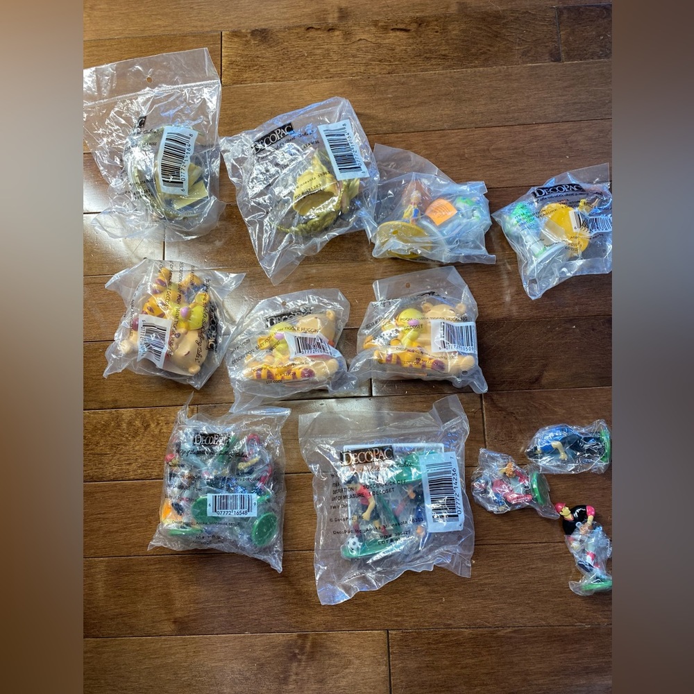 Decopac Disneys & Hockey Players On Top of the Worlds Best Selling Cakes Topper